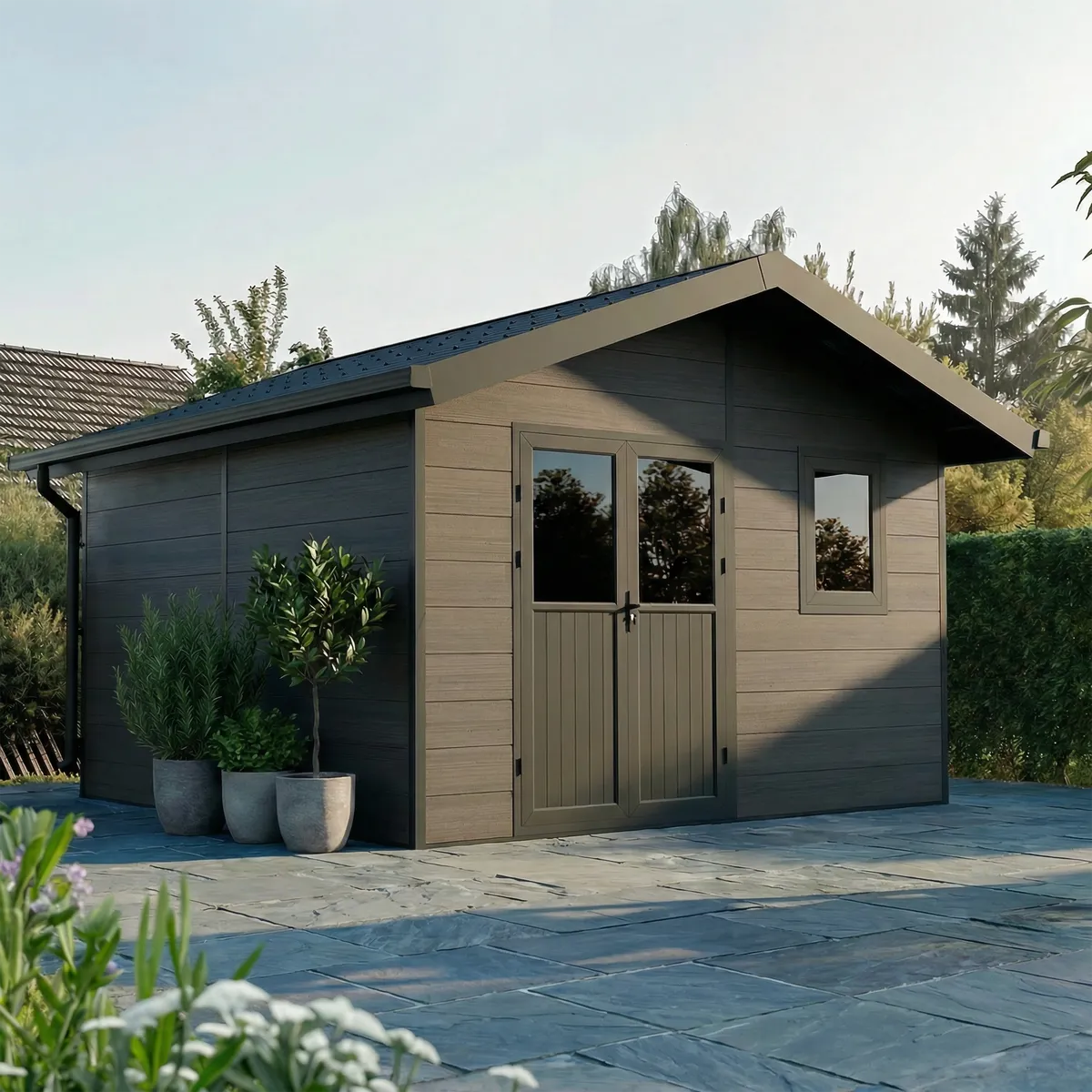 Abri de jardin composite Isora 15 m² gris, ambiance jardin avec verdure